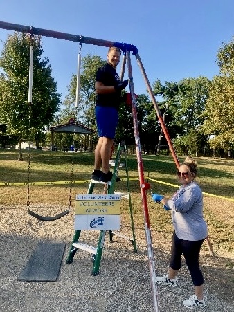 A volunteer helps with a community project during a previous Day of Caring